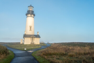 Fototapeta na wymiar Scenic lighthouse in the early morning, Yaquina head in Oregon