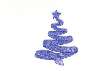 Purple toy Christmas tree on a white background