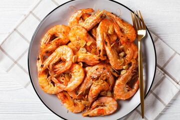 Grilled garlic butter prawns on a plate