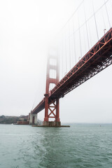 Fototapeta premium Famous Golden Gate bridge in San Francisco on a foggy day