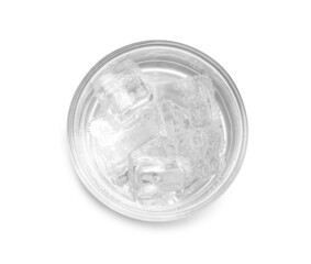 Glass of soda water with ice isolated on white, top view