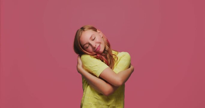 Woman self love. Pretty young girl embrace herself, feel care, hug with self-love, smiling. Women wellness and beauty