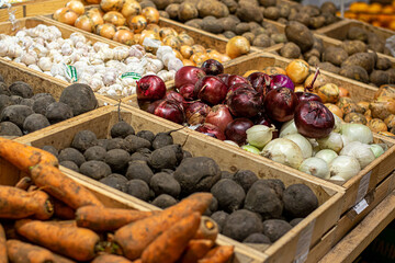 Vegetables in boxes in stores