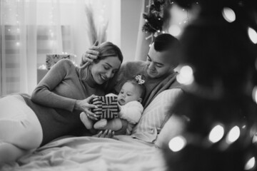 Family with baby daughter on Christmas