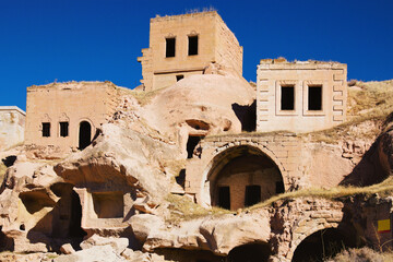 Close-up view of ruins of house in the cave. Picturesque landscape view of ancient cavetown near Goreme in Cappadocia. Popular travel destination in Turkey. UNESCO World Heritage Site