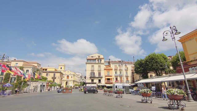 Piazza Tasso in Sorrento, Italy. Square, park, building, architecture, Amalfi, gimbal, camera move, Italian, blue sky / 4K Video Footage
