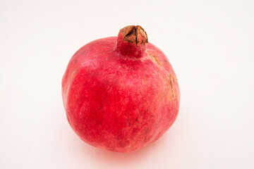 Close-up of a fresh red pomegranate,