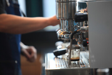 coffee machine preparing fresh coffee , Coffee machine in steam, barista preparing coffee at cafe