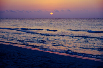 Sunset at the coast of Los Angeles - beautiful view of the sun as she slowly goes down and vanish...