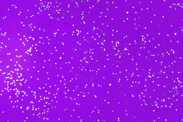 Festive violet background with many many silver stars. Christmas, New Year or Birthday theme concept. An ideal backdrop for your banner or web design. Backplate for happy holidays presentation