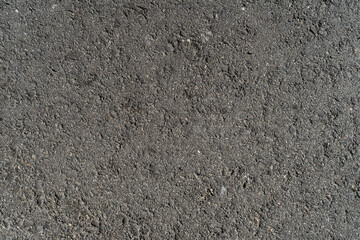 Sidewalk and street concrete asphalt texture with stains and wear