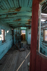 Fototapeta na wymiar View inside an old train wagon in ghost town Rhyolite in the Death Valley