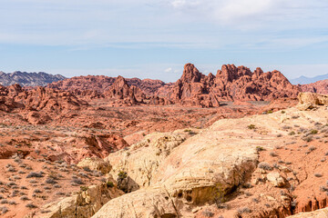 Fototapeta na wymiar Scenic mountainous landscape in a vibrant red color, the Valley of Fire in Nevada