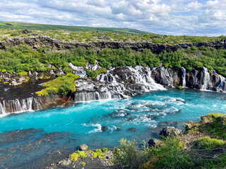 Fototapeta na wymiar Scenic Waterfall Hraunfossar in Iceland