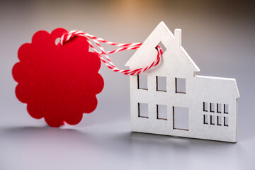 House for rent label on christmas holidays. Wooden house symbol with rent tag on blue background....
