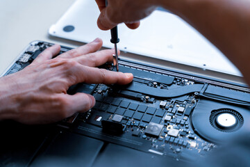 Pc repair service. Computer technician service with laptop on hardware technology background....