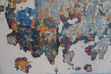 The texture of the multilayer old painted wall.