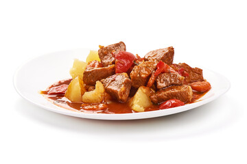 Hungarian goulash, pork stew, isolated on white background.