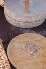 Grinding grains with ancient hand mill
