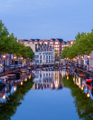 Fototapeta premium Canal during blue hour in Alkmaar city centre, Netherlands