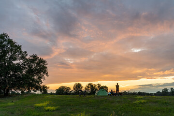 Naklejka na ściany i meble Camping on the banks of the Elbe river during a sunset, Magdeburg, Hohenwarthe, Germany