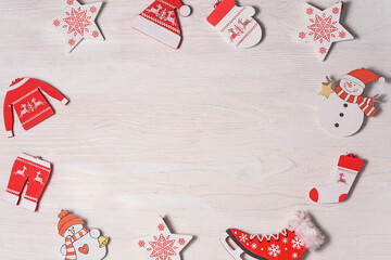 Obraz premium Frame made of Christmas or New Year decorations on white background. Flat lay, top view, isolated, copy space.