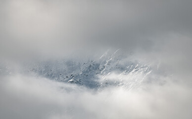 Snowy mountain in the mist