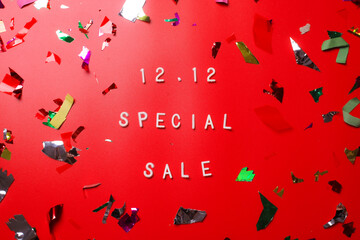 12.12 Shopping day super sale flat lay concept on red background