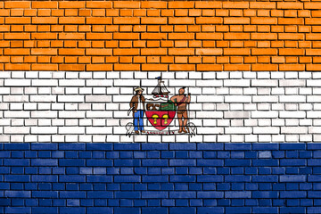 flag of Albany, New York painted on brick wall