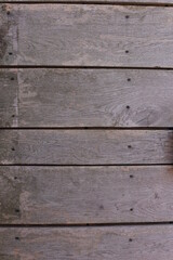 Background of horizontal hewed smooth painted wooden logs close up horizontal view. vintage