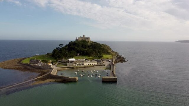 St Michael's Mount near Penzance in Cornwall, England Drone Aerial View - Orbit Left to Right Coast-side