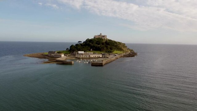 St Michael's Mount near Penzance in Cornwall, England Drone Aerial View - Slow Orbit Right to Left Coast-side