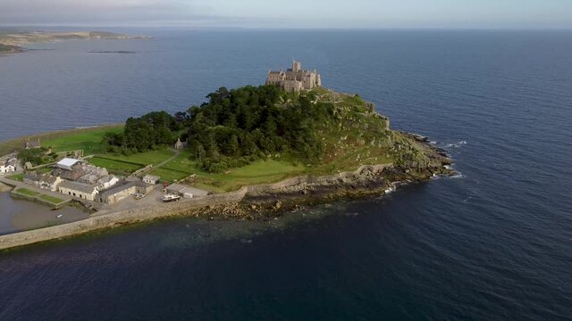 St Michael's Mount near Penzance in Cornwall, England Drone Aerial View - Slow Orbit Left to Right Outward