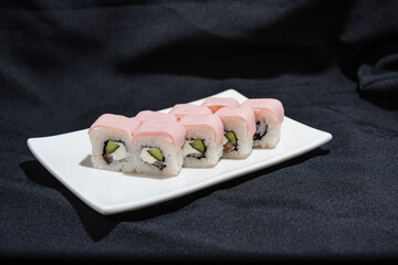 Rolls on black background