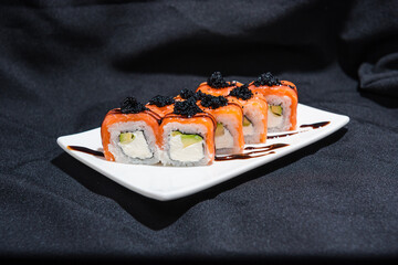 Rolls on black background