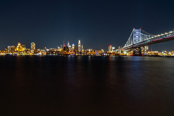 Fototapeta na wymiar Delaware River, Philadelphia, and the Benjamin Franklin Bridge at Night 