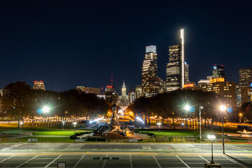 Fototapeta na wymiar Nighttime Shot of Downtown Philadelphia and the Back of the Statue of George Washington on a Horse