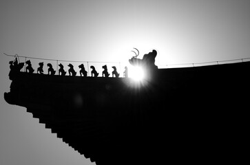 silhouette of a person with a gun