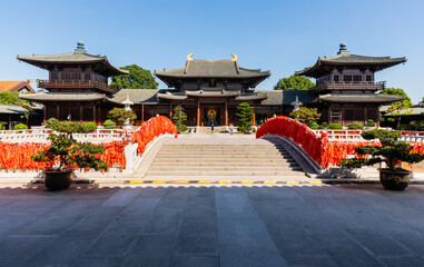 Hall of Four Heavenly Kings behind stone bridge in historic Baoshan or Treasure Mountain Serene Temple, a Buddhist temple at  Luodian Town, Baoshan District, Shanghai, China.