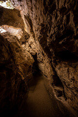 Paved Walkway Through Tunnel in Carlsbad Caverns