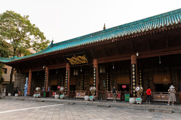 Player Hall at Historic Great Mosque in Chinese style at Muslim Quarter, Xi'an, Shaanxi, China, first build in 8th Century. Heirtage and tourist attraction. - obrazy, fototapety, plakaty