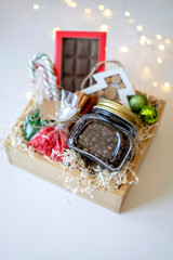 Fototapeta na wymiar Preparing self care package. Seasonal gift box with items for coffee drinking. Copy space
