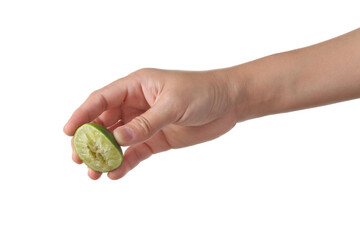 Naklejka na ściany i meble Hand squeeze green lime on white background