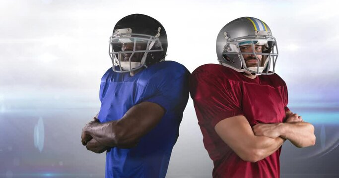 Animation of lights moving over two male american football players standing back to back