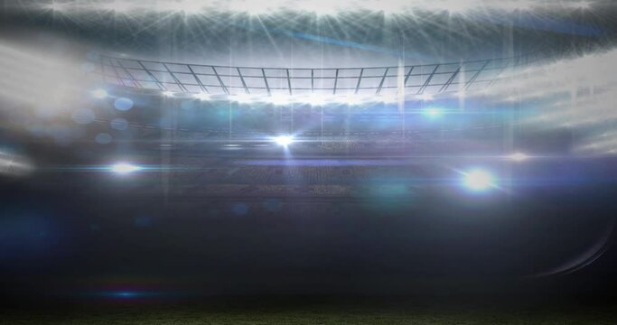 Animation of lights moving over pitch at floodlit stadium