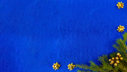 christmas and new year flat lay with copy space and with a new year toy on a blue background