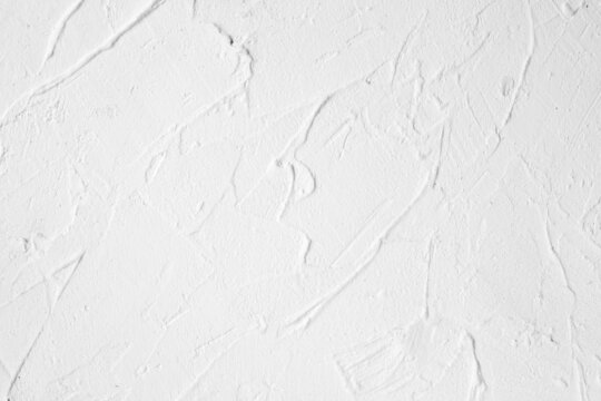 white painted rough plaster wall background texture