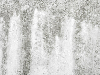 stained old plaster wall with uneven surface. textured background.