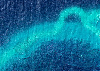 Beautiful bright colorful street art graffiti background. Abstract creative spray drawing fashion colors on the walls of the city. Urban Culture, orange , pink , purple , crimson, blue texture