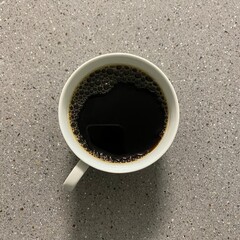 cup of coffee on a grey background